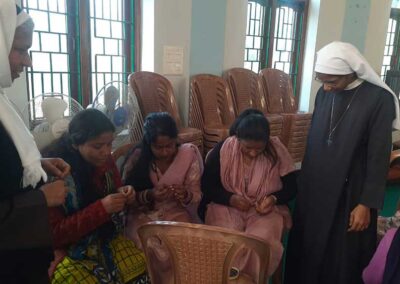 Rosary making with Parishioners- at Bagrana